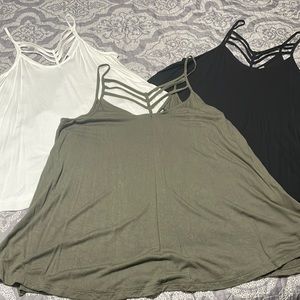 Lot of strappy detail tanks
